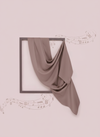 Brown fabric draped over a black frame on a light pink background with musical notes.
