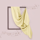 Yellow fabric draped over a black frame on a pink background with musical notes.
