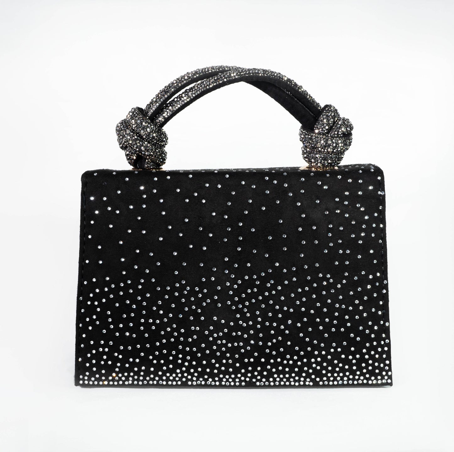 Black handbag with sparkling handle and studded design on a white background