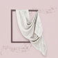 White scarf draped over a black frame on a pink background with musical notes.