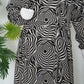 mulaabis-abstract-black-printed-abaya-pockets-front-online-abaya-pakistan