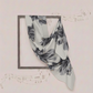 Floral scarf draped over a rectangular frame on a light pink background with musical notes.