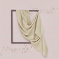 Draped fabric in a frame against a light pink background with musical notes.